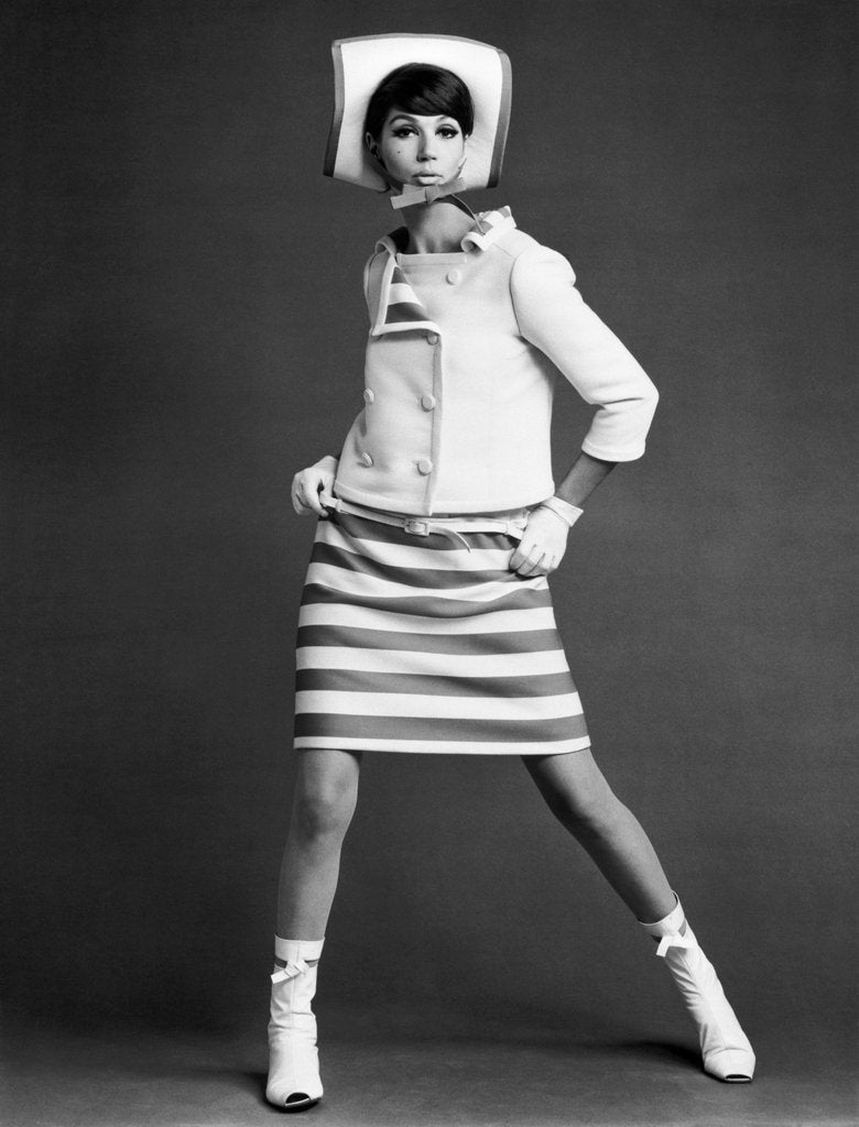 Detail of Simone d'Aillemont in AndrÚ CourÚges dress and jacket by John French