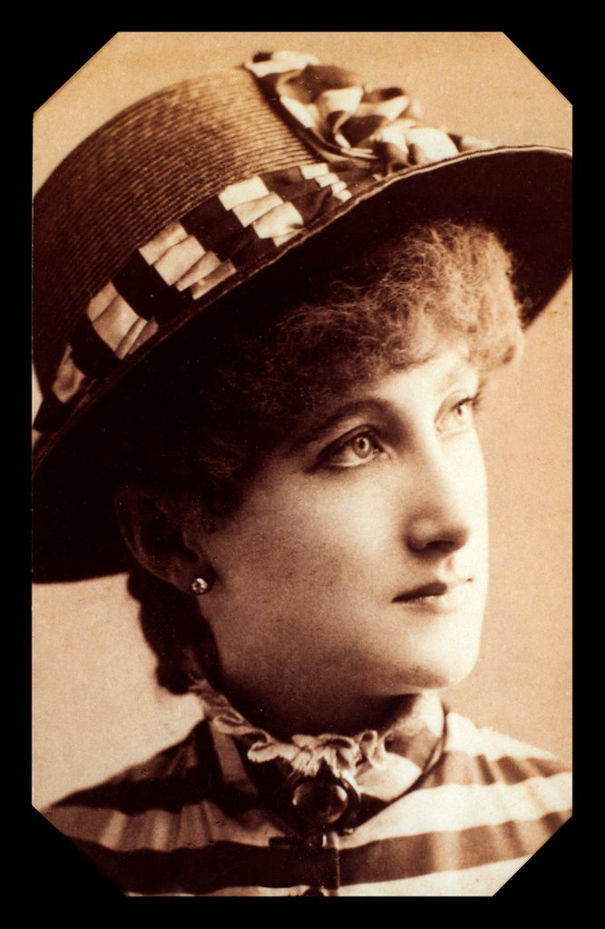 Detail of Maude Branscombe wearing a straw hat and matching dress by Unknown