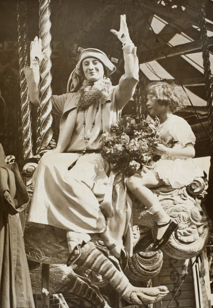 Detail of Anna Pavlova with Betty Bolton on a carousel at Riverside Revel by Anonymous
