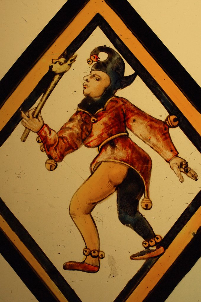 Detail of The Betley Window stained glass panel, detail of a court jester by Stuart Cox
