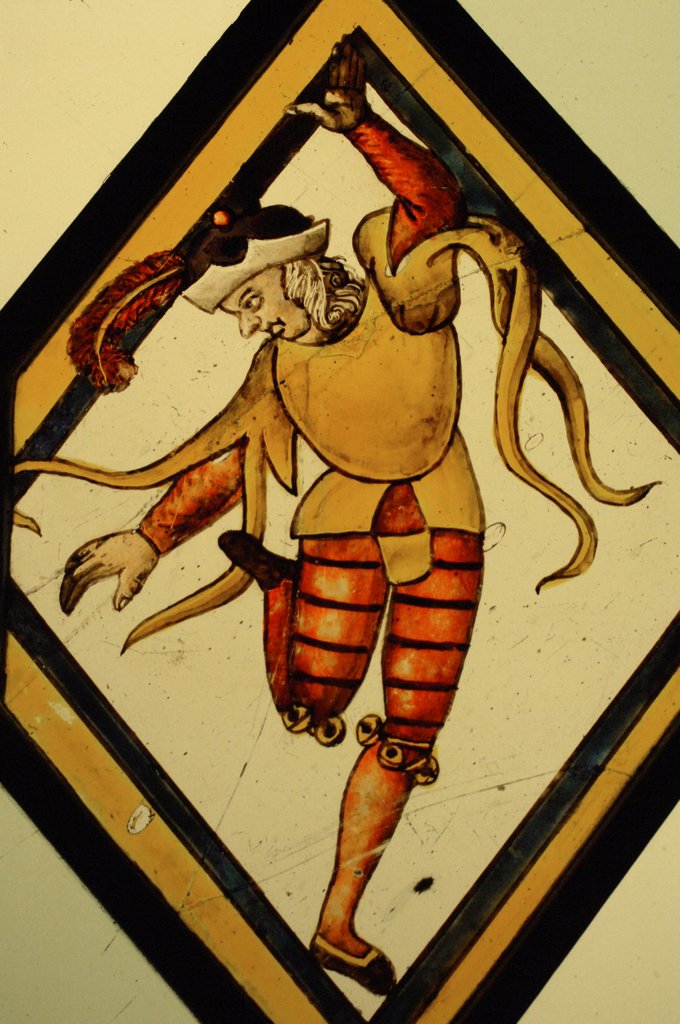 Detail of The Betley Window stained glass panel, detail of a court jester by Stuart Cox