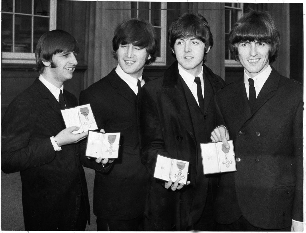 Detail of The Beatles show their MBEs by Associated Newspapers