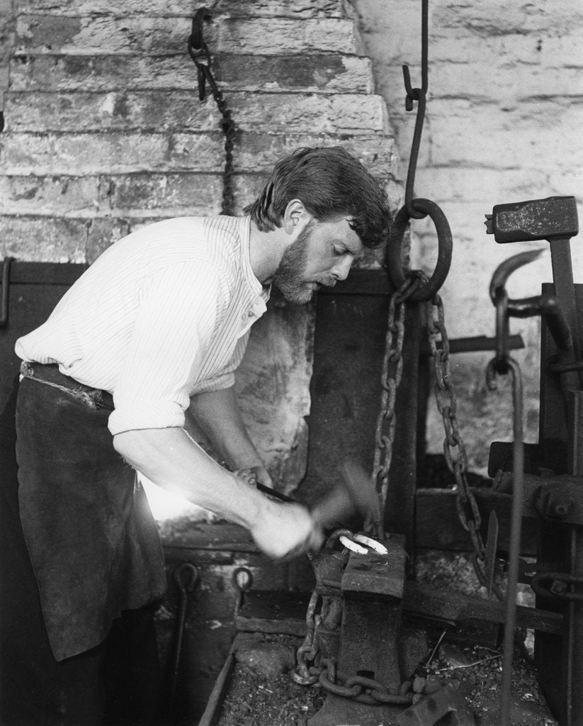 Detail of Black Country Museum, Birmingham, West Midlands, 1986 A blacksmith at work in a smithy by Tony Boxall