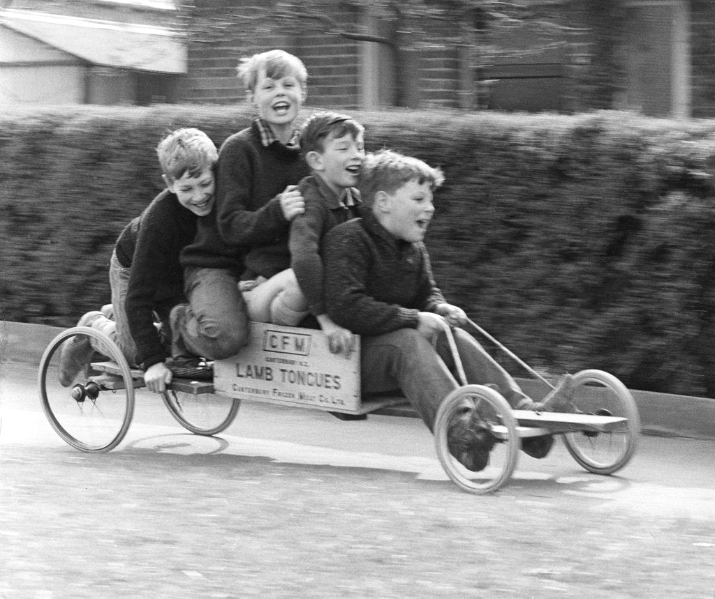 Detail of Boys playing with a home-made go-kart, Horley, Surrey, 1965 by Tony Boxall