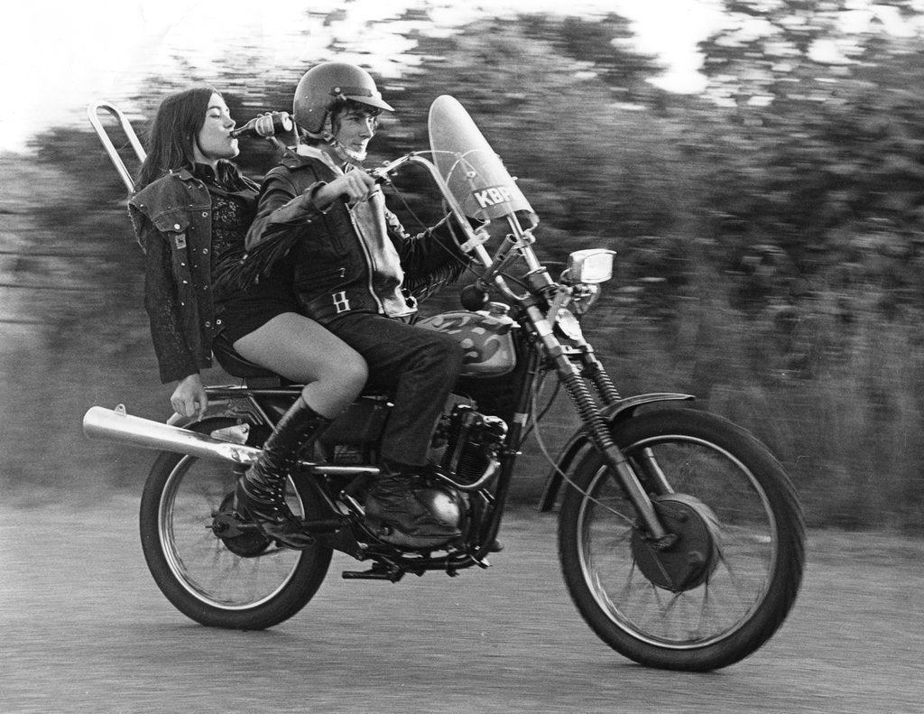 Detail of Teenagers on a motobike, Charlwood, Surrey, 1972 by Tony Boxall