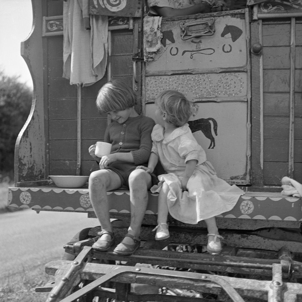 Detail of Children sitting on the steps of a gipsy caravan, Outwood, Surrey, 1963 by Tony Boxall