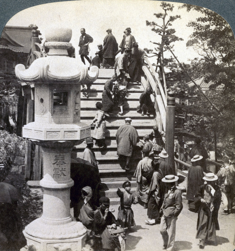 Detail of Worshippers crossing the semi-circular bridge to Kameido Temple beyond, looking north, Tokyo, Japan by Underwood & Underwood