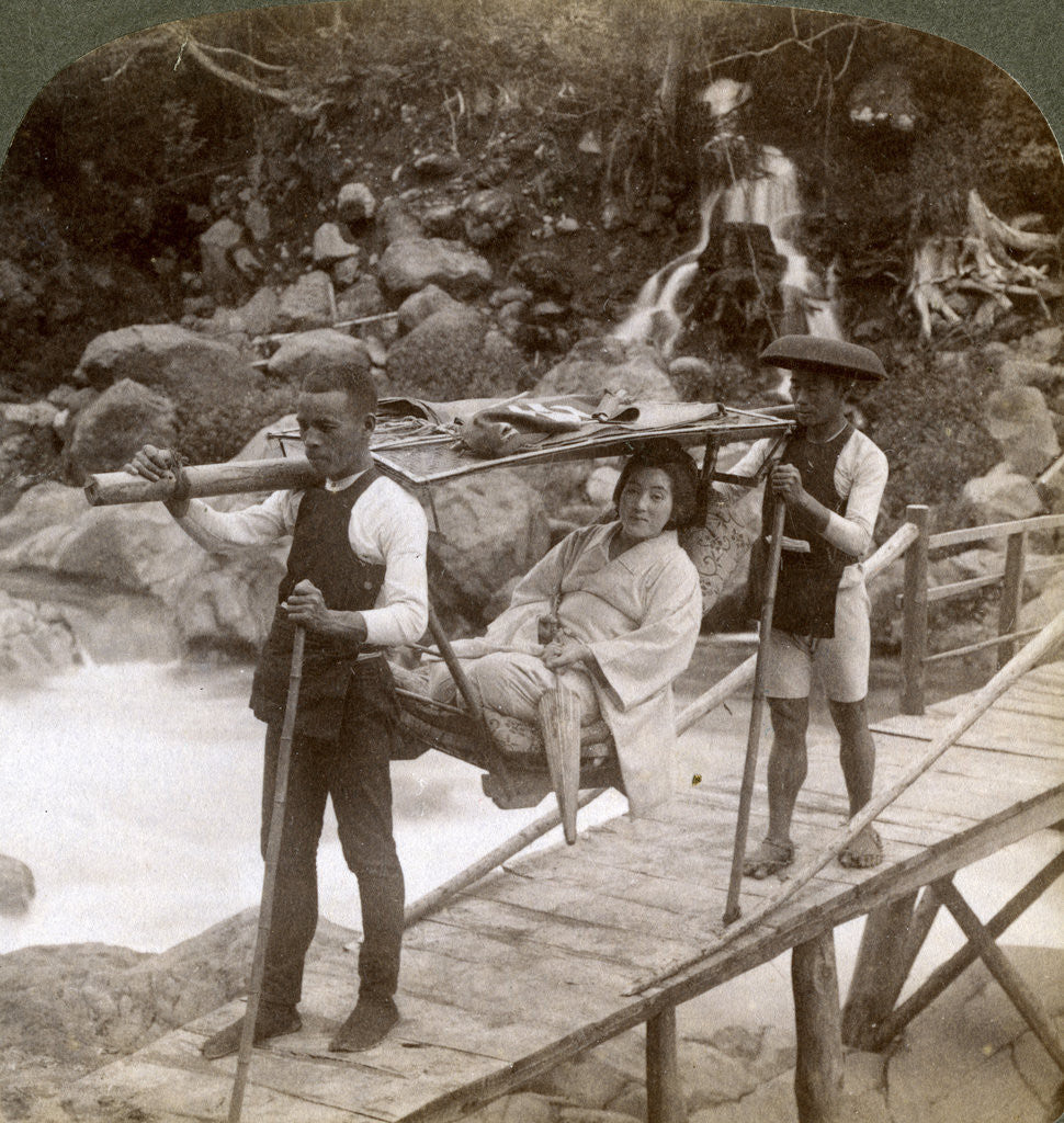 Detail of Japanese woman in a yamakago (mountain chair) crossing the torrential Daiya river near Nikko, Japan by Underwood & Underwood