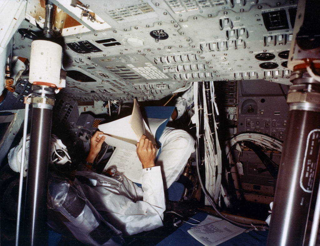 Detail of An astronaut inside a NASA Command Module by NASA