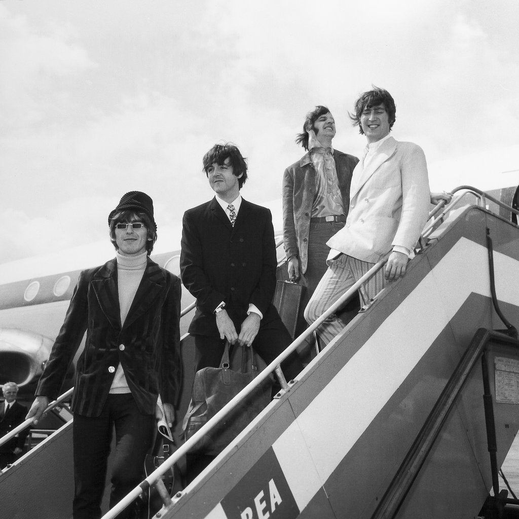 Detail of The Beatles on the steps of a plane by Associated Newspapers