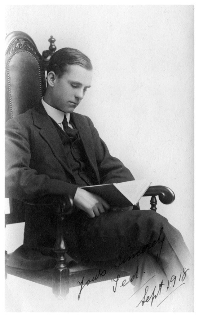 Detail of Man sitting in a chair reading a book by Anonymous