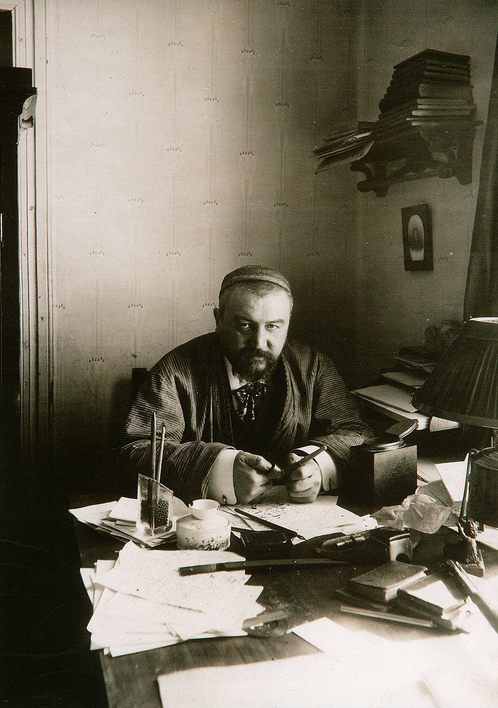 Detail of Alexander Kuprin, Russian author, at his desk, Gatchina, Russia, early 20th century. by Karl Karlovich Bulla
