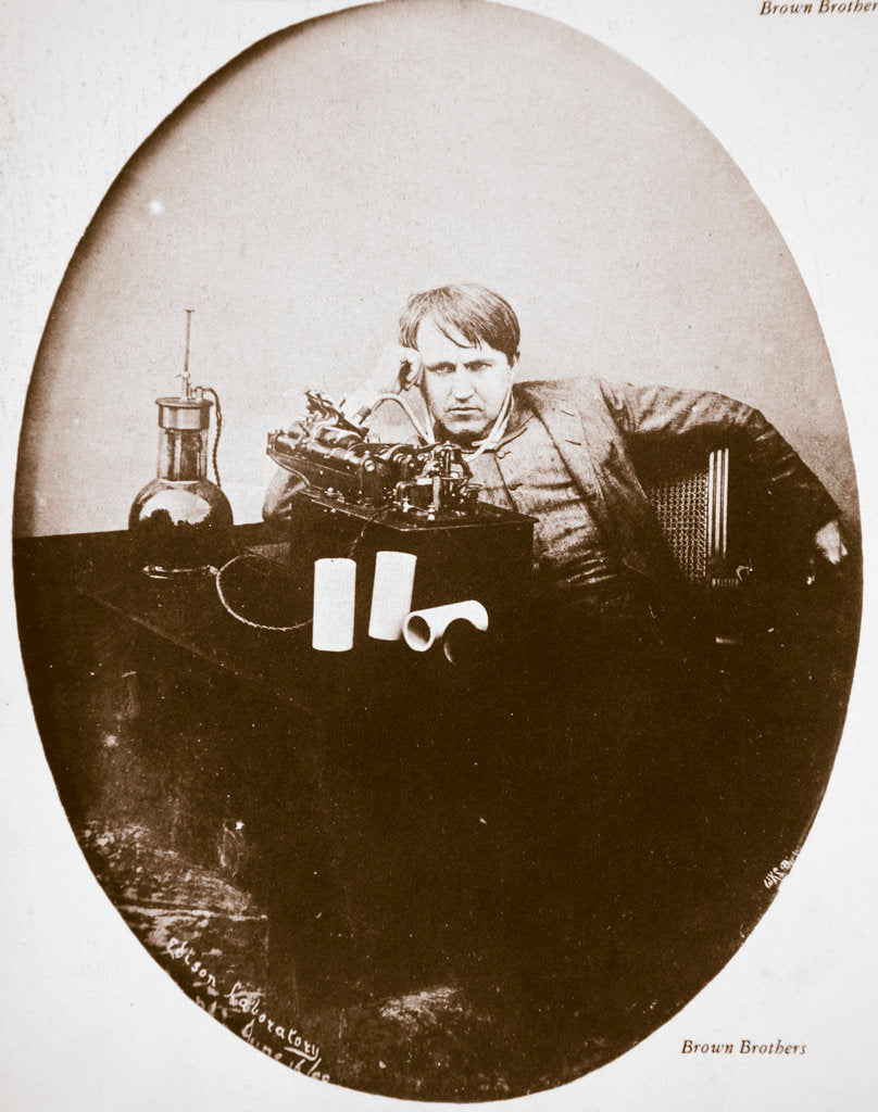 Detail of Thomas Alva Edison, American inventor, sitting beside his improved machine by Anonymous