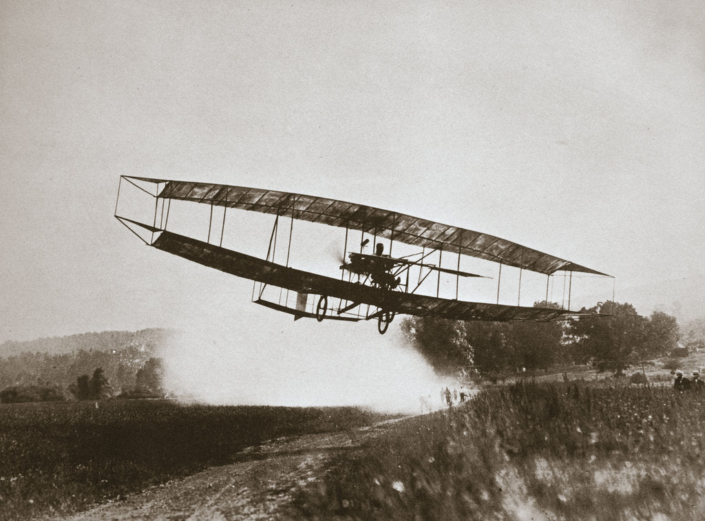 Detail of American aviator Glenn Curtiss making the first heavier-than-air flight in his June Bug, 1908 by Edwin Levick