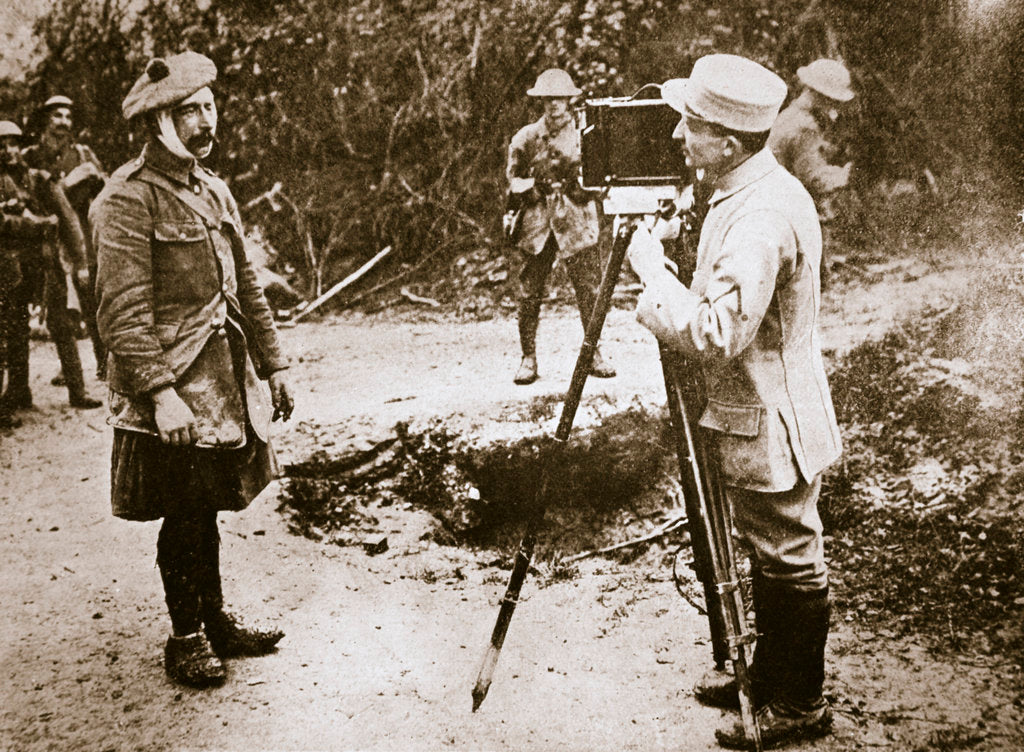Detail of Cameraman filming a wounded soldier by Anonymous