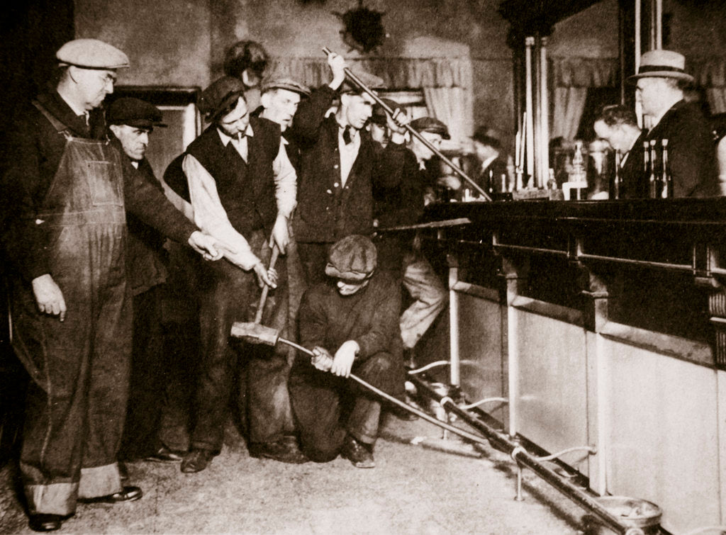 Detail of A bar in Camden, New Jersey, being forcibly dismantled by dry agents by Anonymous