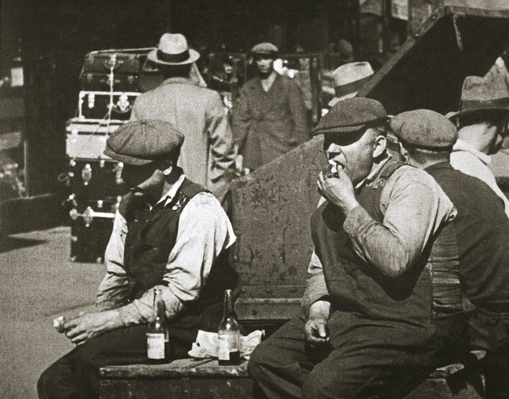 Detail of Day labourers having a hot dog and lemonade, Battery Park, New York, USA, early 1930s by Unknown