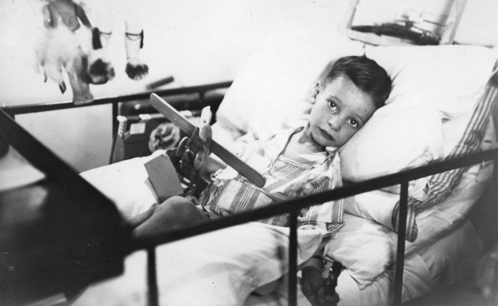 Detail of Greek boy from Pylos being nursed in the sick bay of the British battleship HMS Malaya by Anonymous