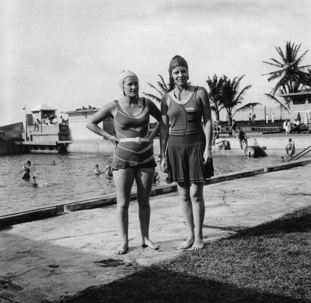 Detail of Two women in swimsuits beside a swimming pool, Balboa, Panama by Anonymous
