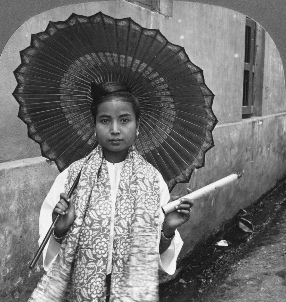 Detail of Young Burmese woman holding a huge cigar, Rangoon, Burma by Stereo Travel Co