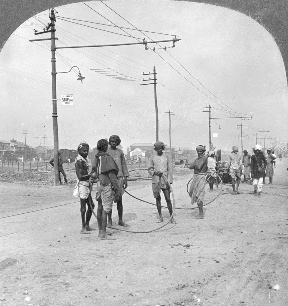 Detail of Men about to draw a heavy load, Rangoon, Burma by Stereo Travel Co