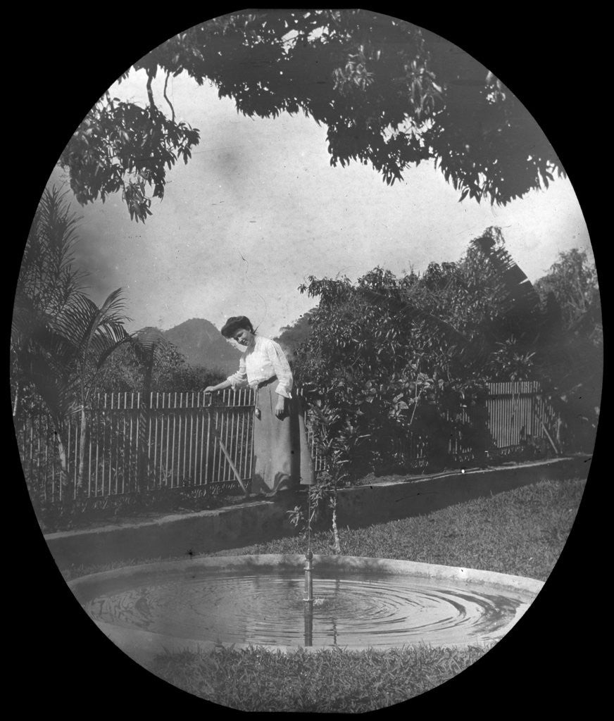 Detail of Woman by a pond in a garden, Rio de Janeiro, Brazil by Anonymous