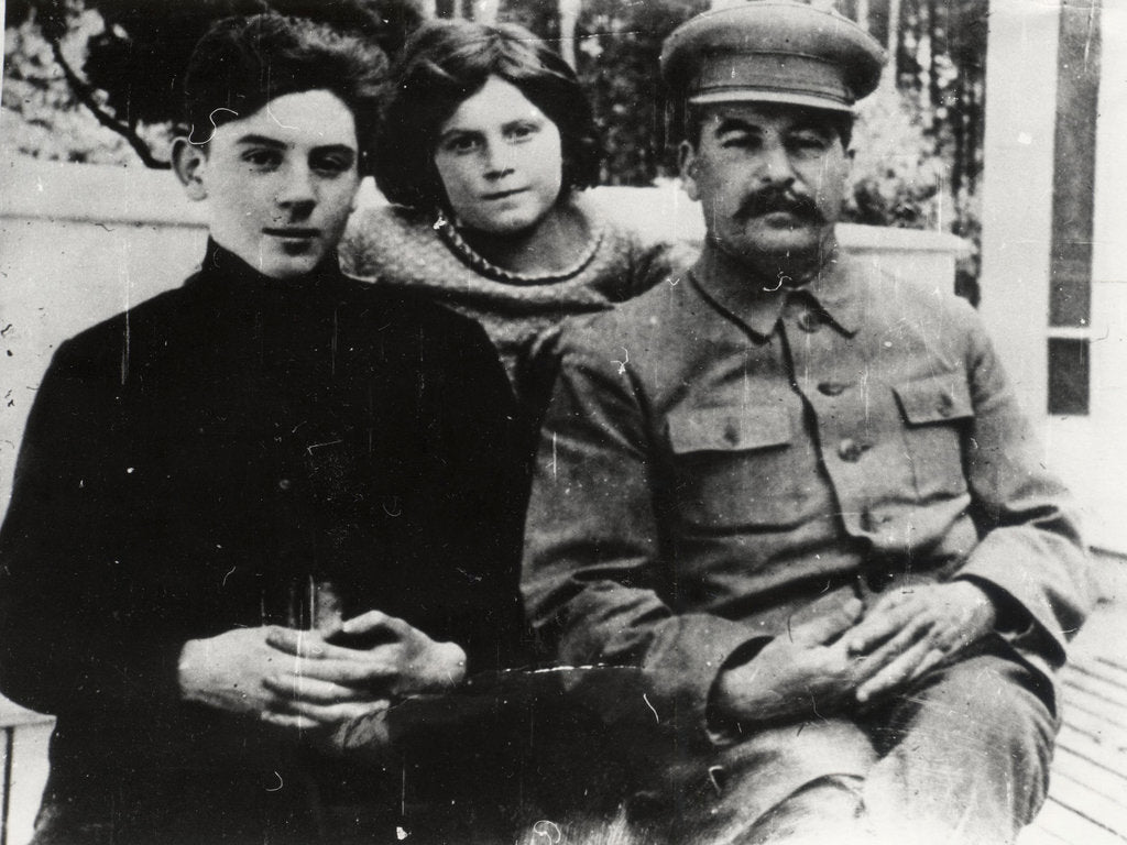 Detail of Soviet leader Josef Stalin with his son Vasily and daughter Svetlana, 1930s. by Pyotr Otsup.