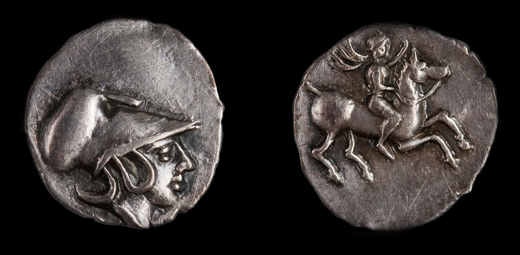 Detail of Emporiae coin. Obverse: Head of Athena with Corinthian helmet, 4th century BC by Ancient Coins Numismatic