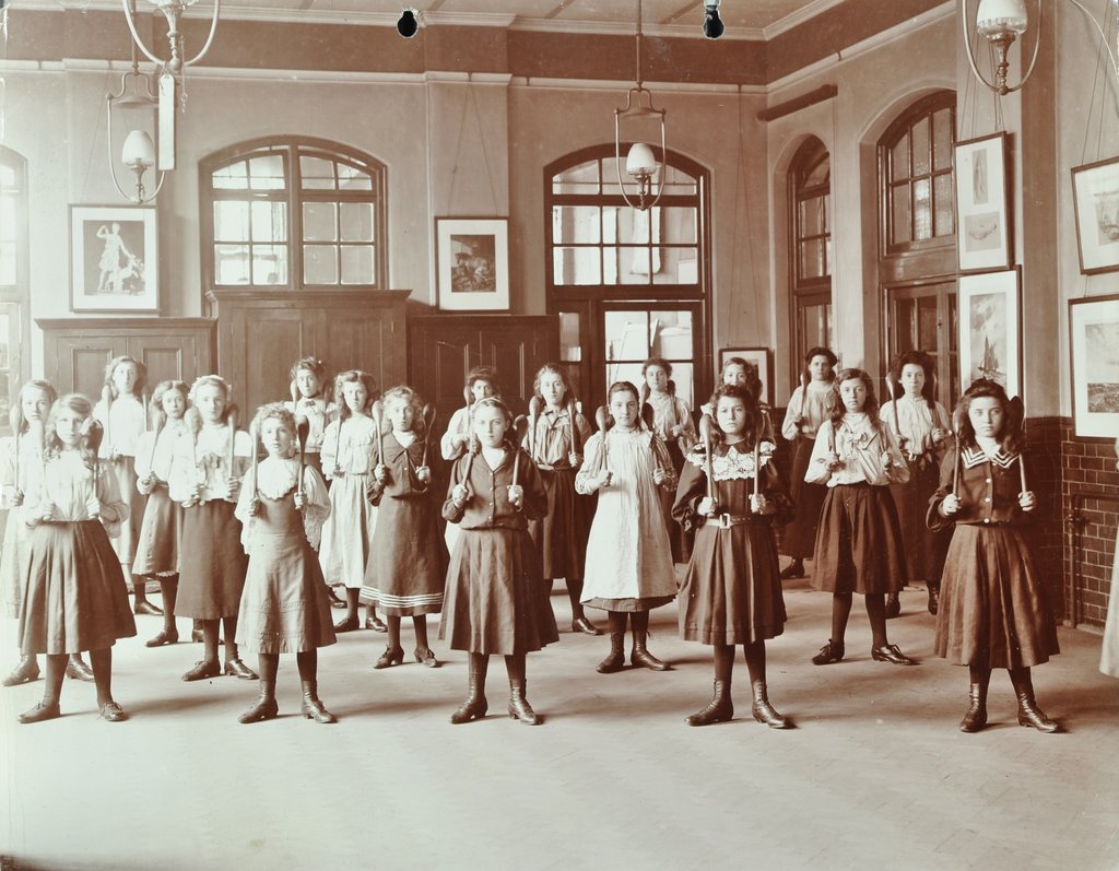 Detail of Girls holding Indian clubs, Cromer Street School/ Argyle School, St Pancras, London, 1906 by Unknown