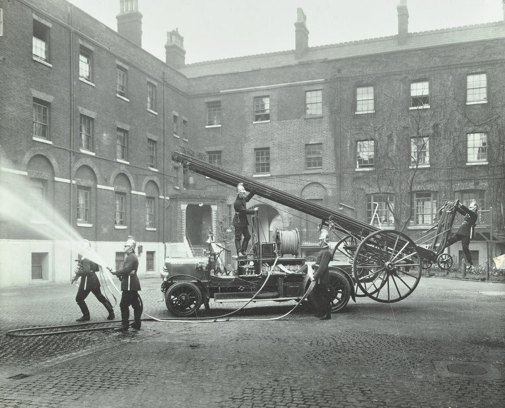 Detail of Fireman using a hose, London Fire Brigade Headquarters, London, 1910 by Unknown