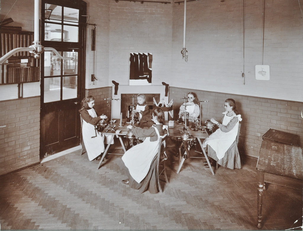 Detail of Girls knitting socks by machine at the Elm Lodge School for Blind Girls, London, 1908 by Unknown