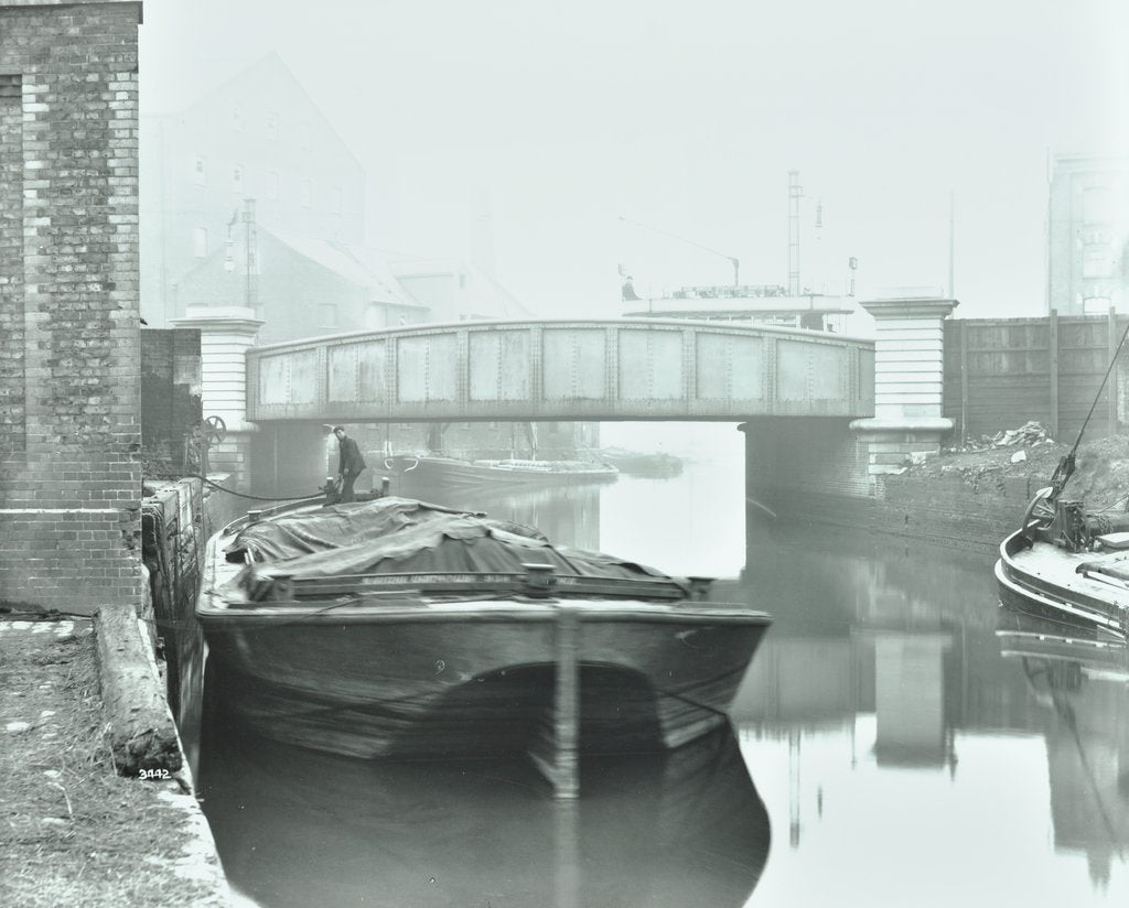 Detail of Man mooring a barge by a river bank, Poplar, London, 1905 by Unknown