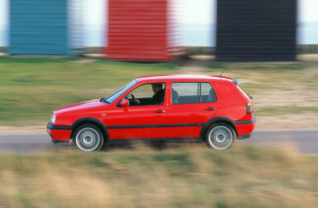 Detail of Man driving 1996 Vokswagen Golf Gti by Unknown
