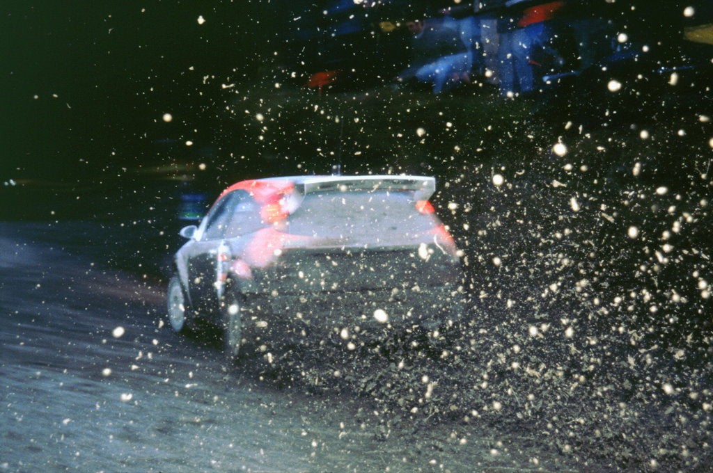 Detail of 1999 Ford Focus WRC, C.McRae. Network Q Rally with flying mud! by Unknown
