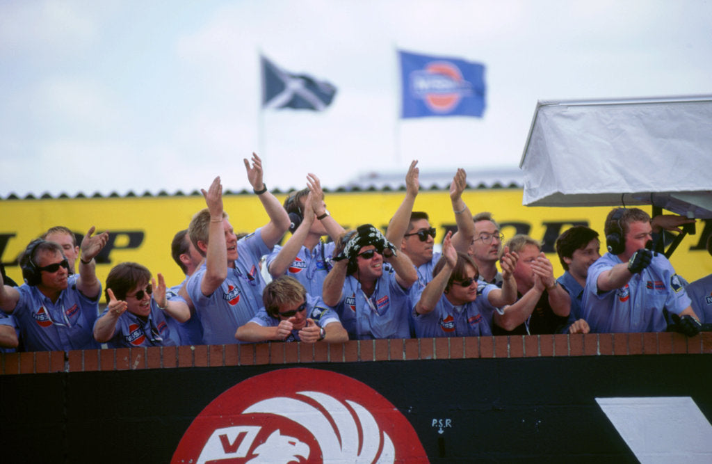 Detail of Nissan team celebrate victory 1998 British touring cars. by Unknown
