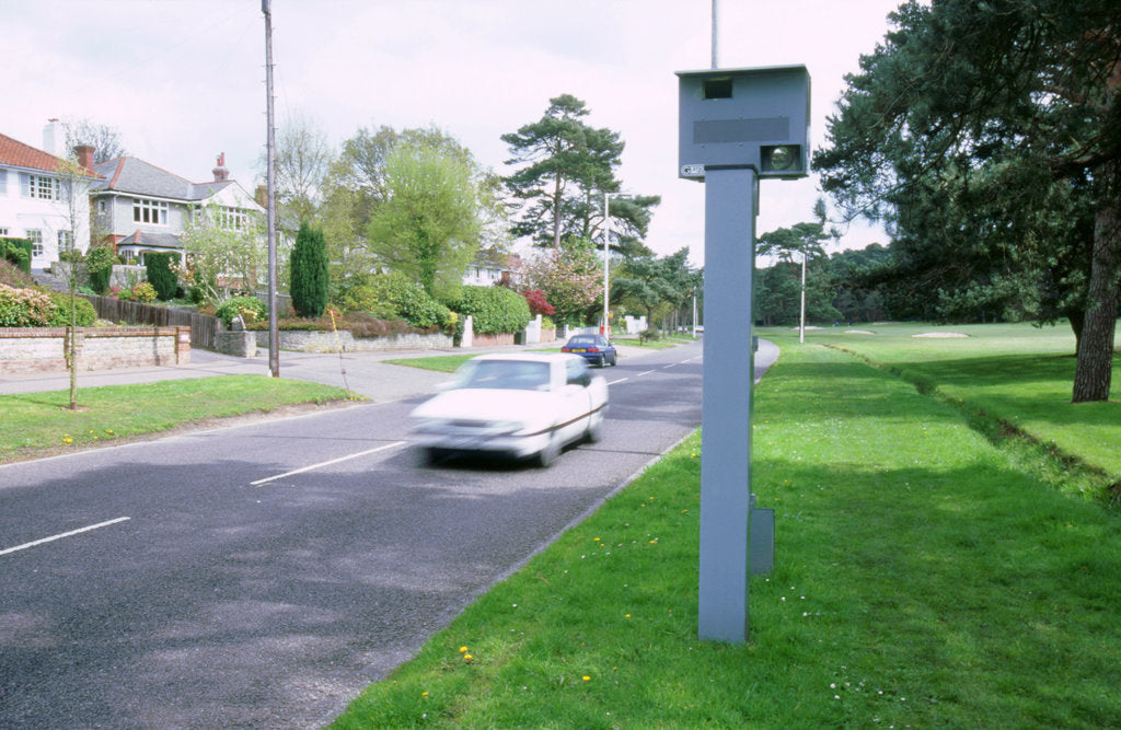 Detail of Speed Camera and traffic by Unknown