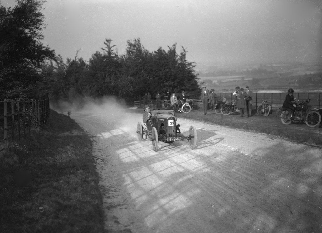 Detail of HR Godfrey driving a GN Bluebottle, Inter-Varsity Hillclimb, Tring, Hertfordshire, 5 March 1921 by Bill Brunell