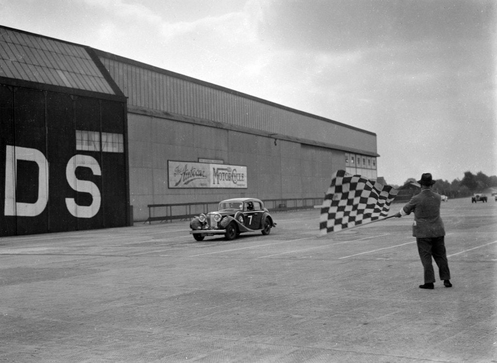 Detail of HJ Ripley's SS Jaguar taking the chequered flag, MCC Members Meeting, Brooklands, 10 September 1938 by Bill Brunell