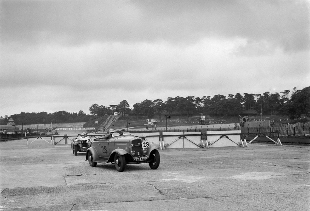 Detail of J Cleland's Ford V8 and JH Barker's Riley Lynx at the chicane, JCC Members Day, Brooklands, 1939 by Bill Brunell
