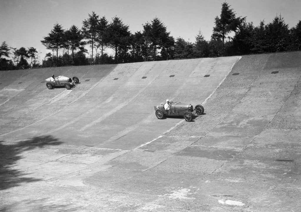 Detail of Two Bugatti Type 35s racing on the Members Banking at Brooklands by Bill Brunell