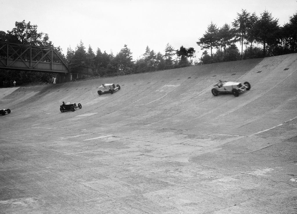 Detail of Invicta, Talbot and Frazer-Nash cars racing on the Members Banking at Brooklands by Bill Brunell