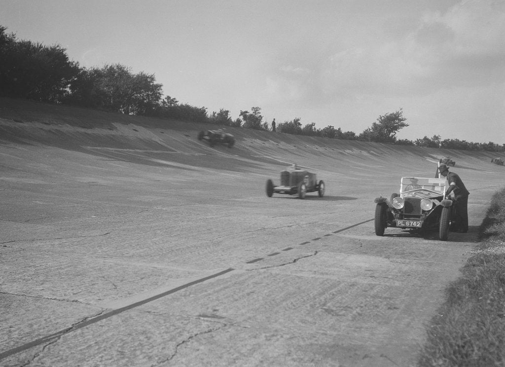 Detail of Cars racing on Byfleet Banking during the BRDC 500 Mile Race, Brooklands, 3 October 1931 by Bill Brunell