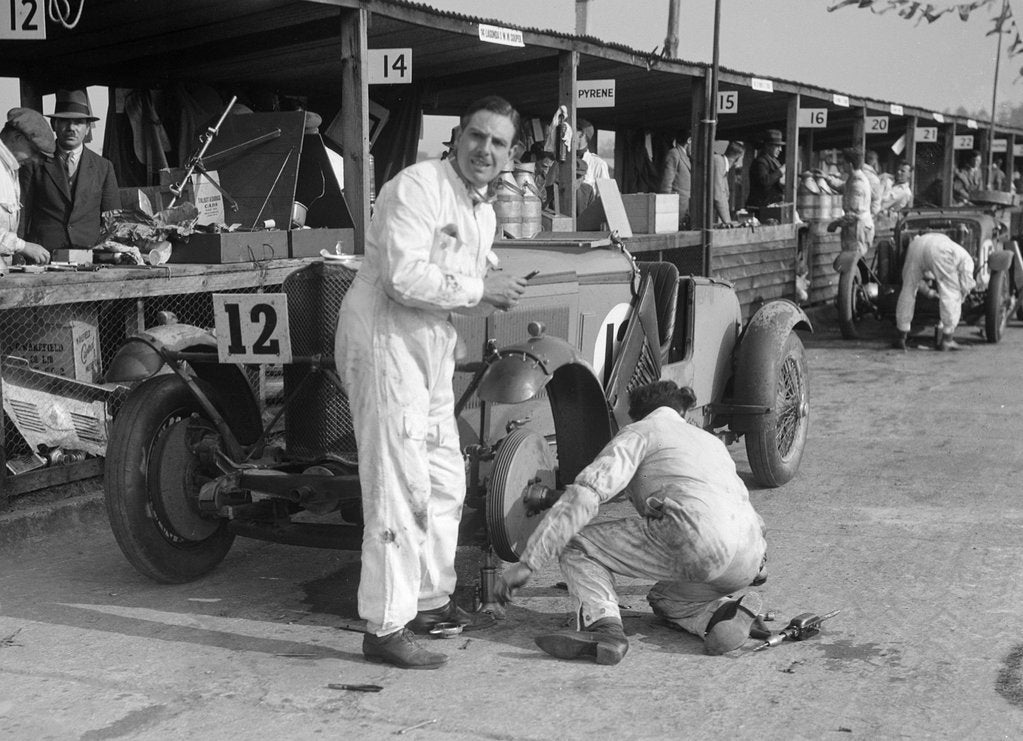 Detail of Mechanic working on a Talbot 105 at the JCC Double Twelve race, Brooklands, 8/9 May 1931 by Bill Brunell