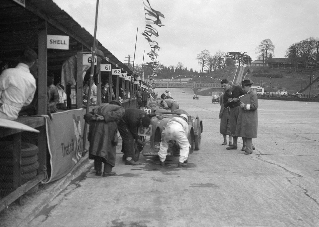 Detail of N Black and CW Fiennes' MG C type in the pits at the JCC Double Twelve race, Brooklands, May 1931 by Bill Brunell