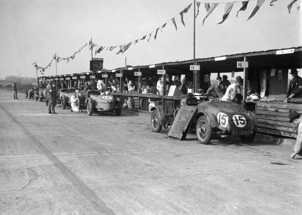 Detail of Talbot 105 and Lea-Francis cars in the pits at the JCC Double Twelve race, Brooklands, 8/9 May 1931 by Bill Brunell