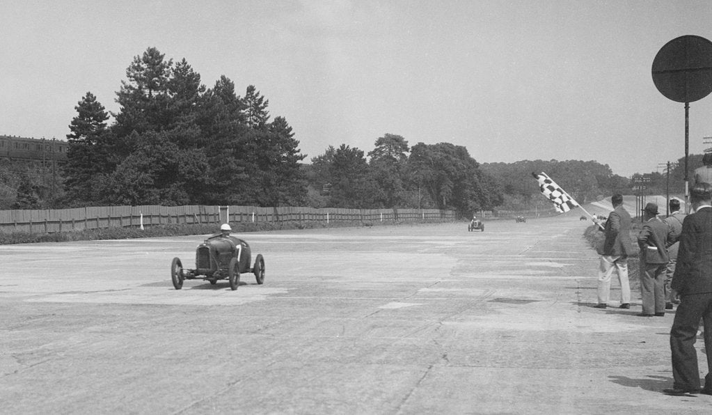 Detail of Two Salmson cars taking the chequered flag at Brooklands by Bill Brunell