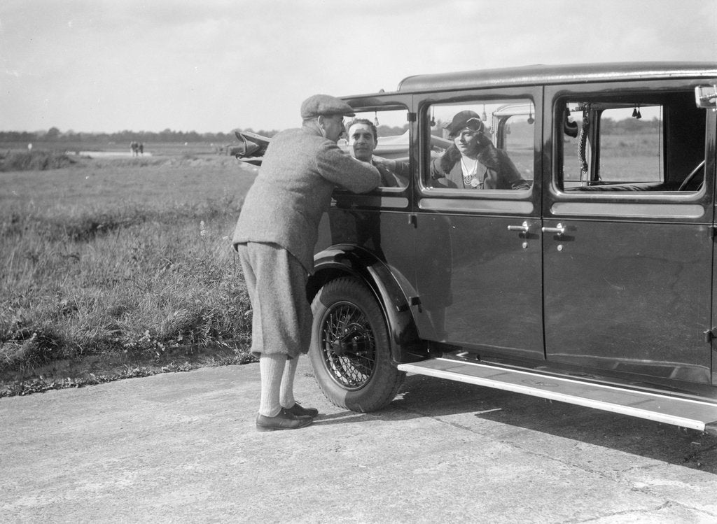 Detail of Hugh McConnell, Sammy Davis and Mrs Davis with an Austin 20/6 landaulette at Brooklands, 1931 by Bill Brunell