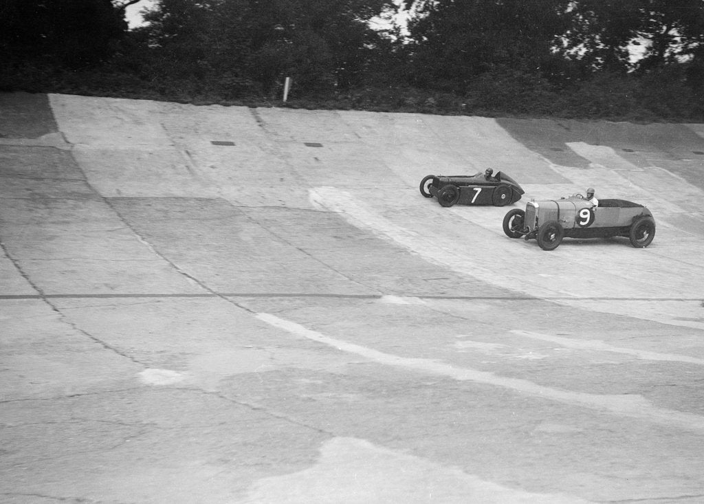 Detail of Austin 747 cc works racer and another car on the Members Banking at Brooklands by Bill Brunell