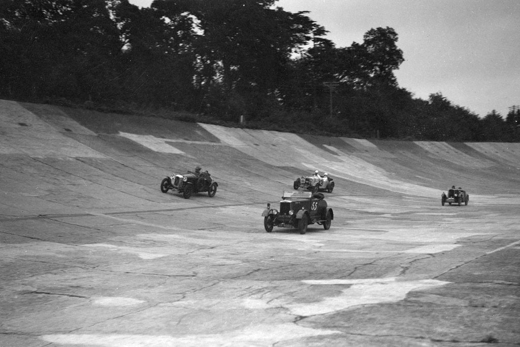 Detail of Cars racing on the banking at a JCC Members Day, Brooklands by Bill Brunell
