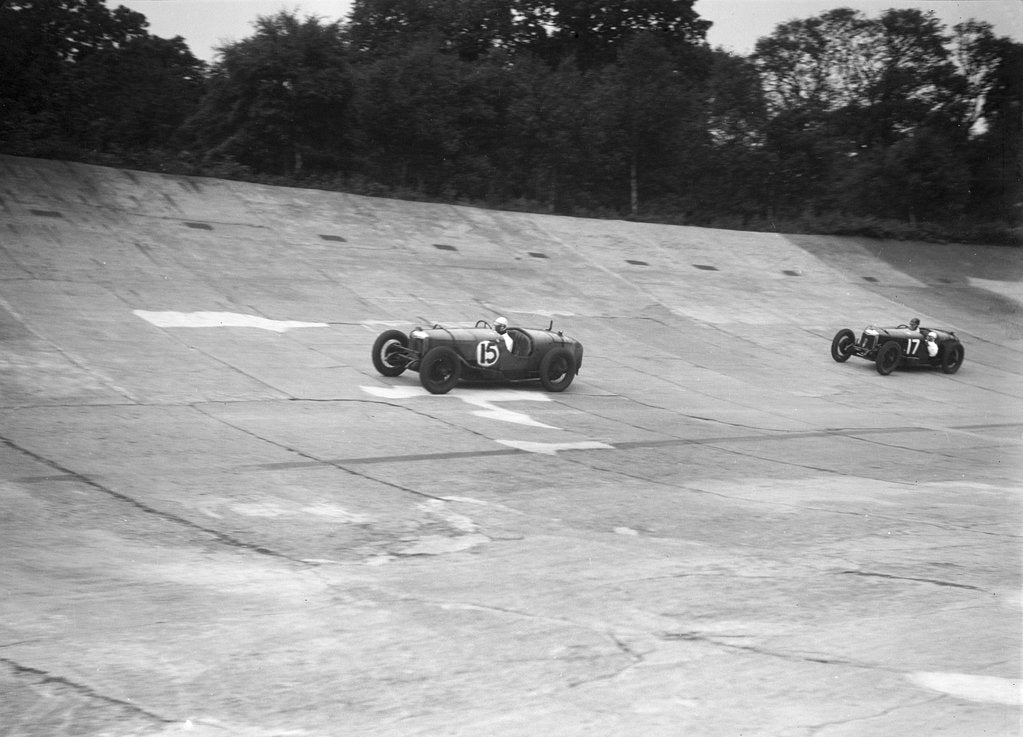 Detail of Two Riley 9 Brooklands racing on the banking at a JCC Members Day, Brooklands by Bill Brunell